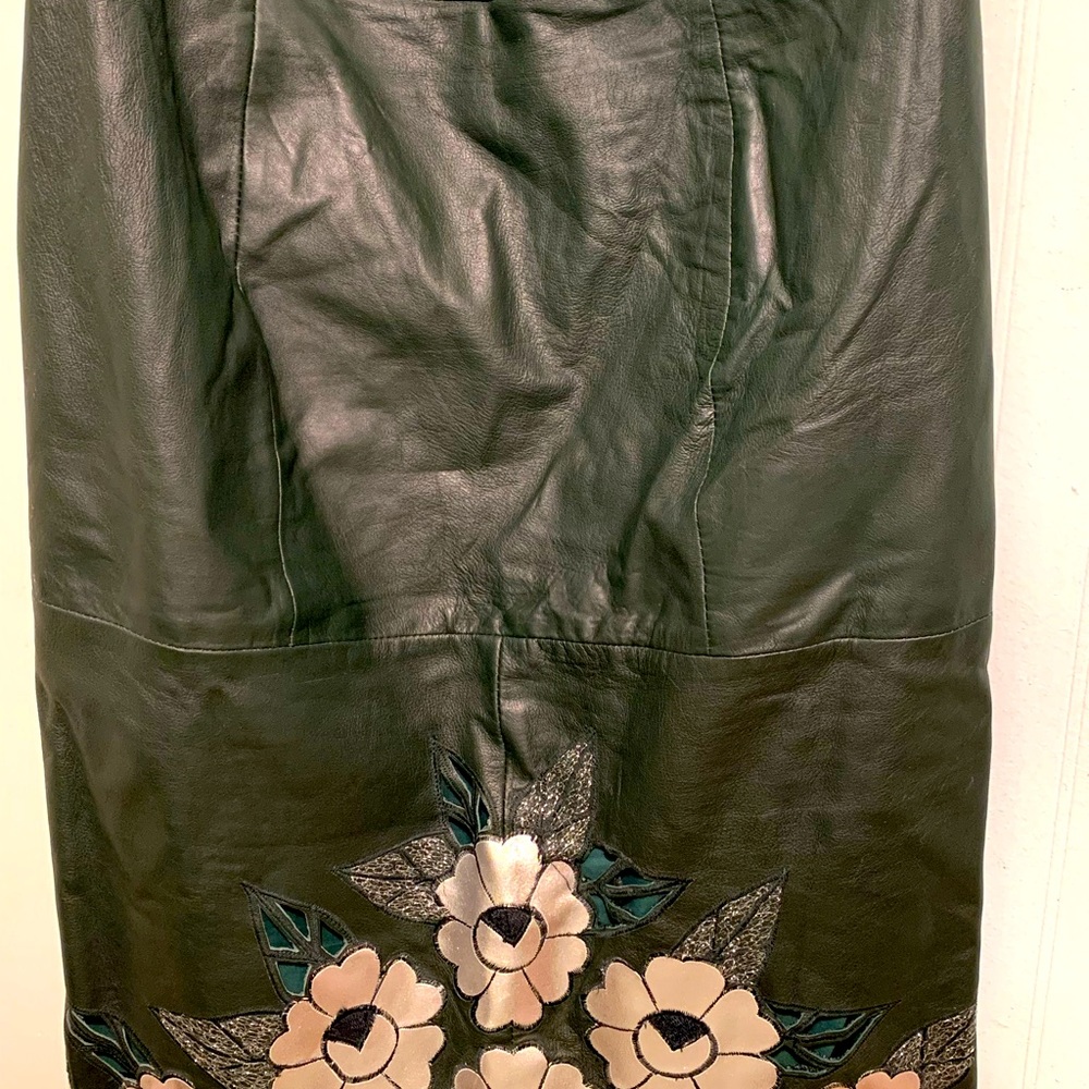 Leather jacket, bottom dress and blouse.  Very beautiful, used. good condition.